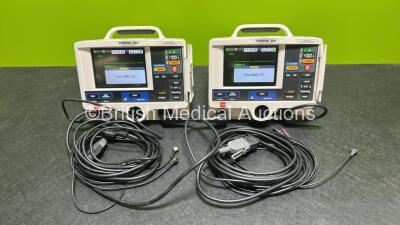 2 x Lifepak 20e Defibrillators / Monitors *Mfd - 2015 / 2015* (Both Power Up) Including Pacer, ECG and Printer Options with 2 x Li-ion Batteries, 2 x ECG Leads and 2 x Paddle Cables *SN 43884766 / 43880773*