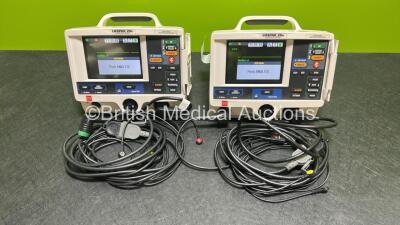 2 x Lifepak 20e Defibrillators / Monitors *Mfd - 2015 / 2015* (Both Power Up) Including Pacer, ECG and Printer Options with 2 x Li-ion Batteries, 2 x ECG Leads and 2 x Paddle Cables *SN 43883320 / 43879731*