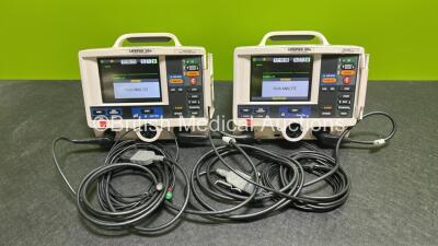 2 x Lifepak 20e Defibrillators / Monitors *Mfd - 2015 / 2015* (Both Power Up) Including Pacer, ECG and Printer Options with 2 x Li-ion Batteries, 2 x ECG Leads and 2 x Paddle Cables *SN 43874869 / 43881371*