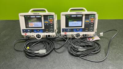 2 x Lifepak 20e Defibrillators / Monitors *Mfd - 2015 / 2015* (Both Power Up) Including Pacer, ECG and Printer Options with 2 x Li-ion Batteries, 2 x ECG Leads and 2 x Paddle Cables *SN 43880728 / 43884646*