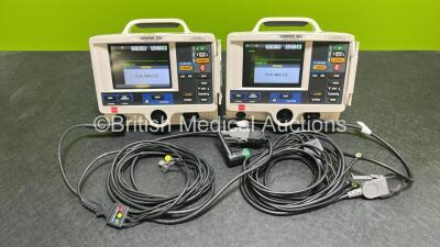 2 x Lifepak 20e Defibrillators / Monitors *Mfd - 2015 / 2015* (Both Power Up) Including Pacer, ECG and Printer Options with 2 x Li-ion Batteries, 2 x ECG Leads and 2 x Paddle Cables *SN 43880728 / 43884646*