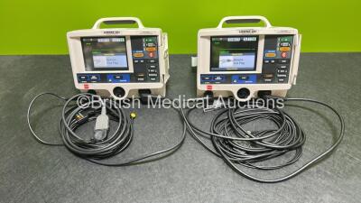 2 x Lifepak 20e Defibrillators / Monitors *Mfd - 2015 / 2015* (Both Power Up) Including Pacer, ECG and Printer Options with 2 x Li-ion Batteries, 2 x ECG Leads and 2 x Paddle Cables *SN 43881329/ 43880823*