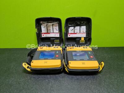 2 x Medtronic Lifepak 1000 Defibrillators *Mfd - 2015 / 2011* (Both Power Up) in Carry Case with 2 x Li/Mn02 Batteries *Install Before - 2024 / 2028*