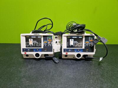 2 x Lifepak 20e Defibrillators / Monitors *Mfd - 2020 / 2016* (Both Power Up) Including ECG and Printer Options with 2 x Li-ion Batteries, 2 x ECG Leads and 2 x Paddle Cables