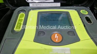 2 x Zoll AED PRO Defibrillators (Both Power Up,1 x with Damaged Screen) In Carry Case with 2 x 3 Lead ECG Leads and 2 x Batteries - 2