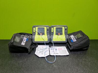 2 x Zoll AED PRO Defibrillators (Both Power Up, 1 x with Damaged Screen) In Carry Case with 2 x 3 Lead ECG Leads and 2 x Batteries