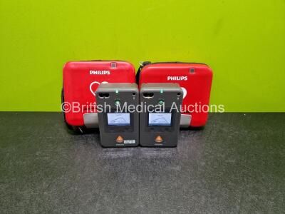 2 x Philips FR3 Defibrillators (Both Power Up) in Carry Case with 2 x LiMnO2 Batteries *Install Before - 2025 / 2025* **SN C16H-0016 / C16H-00079**
