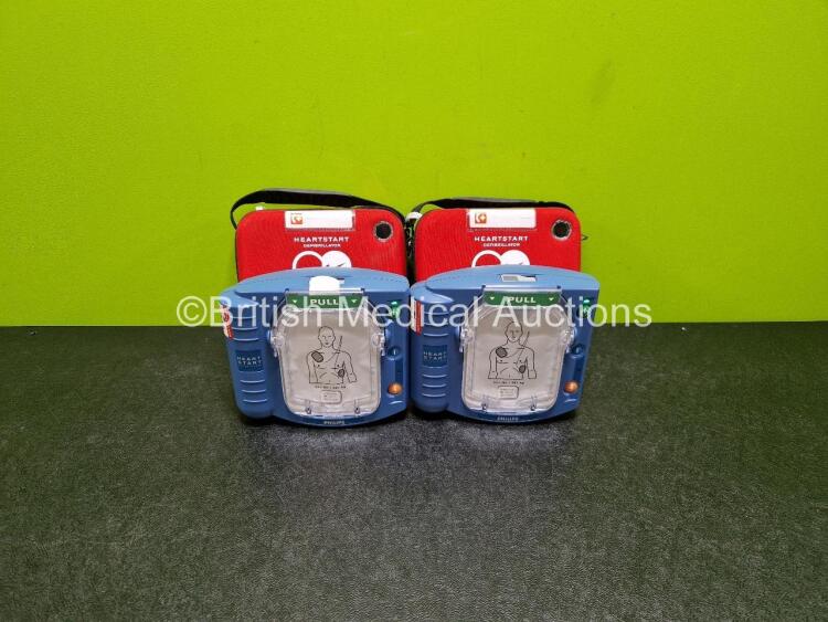 2 x Philips Heartstart HS1 Defibrillators (Both Power Up) In Carry Case with 2 x LiMnO2 M5070A Batteries *Install Before 2026 / 2026* **SN A21C01082 / A21C01678**
